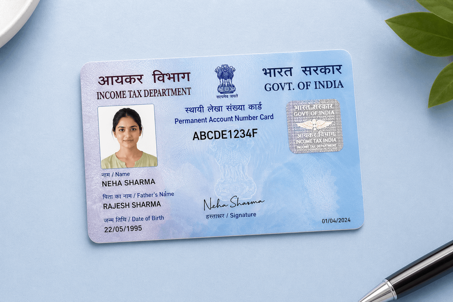 PAN card photo card preview showing a PAN-style card on a desk